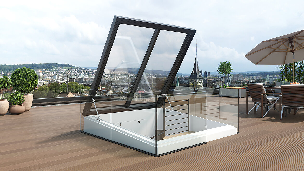 Moderne Dachterrasse mit aufklappbarem Glasdach und Blick auf eine Stadt mit Kirchturm.